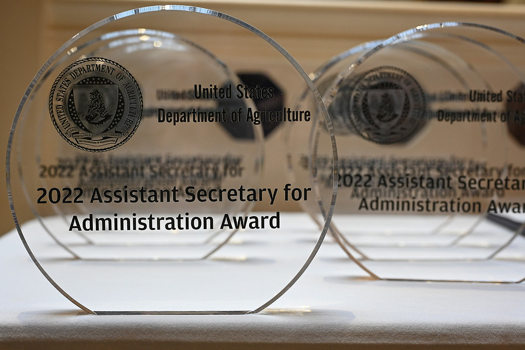 Award ceremony representing EB-1A extraordinary ability criteria