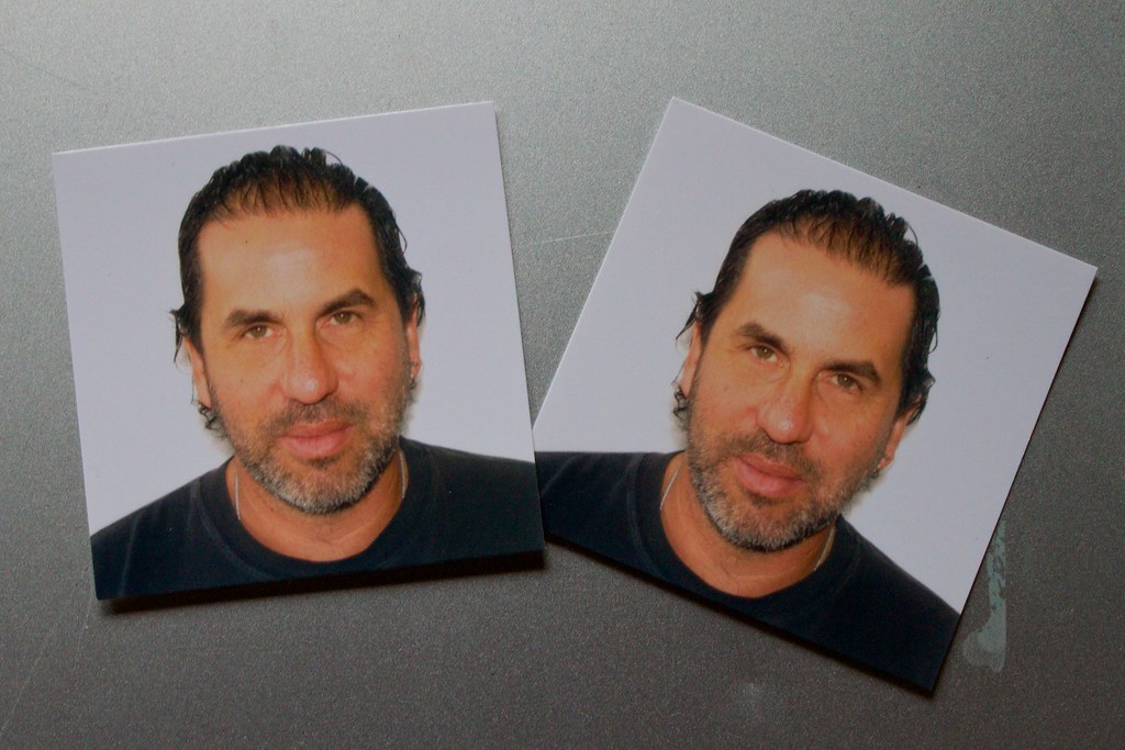 Immigration photos must be passport-style and meet specific standards