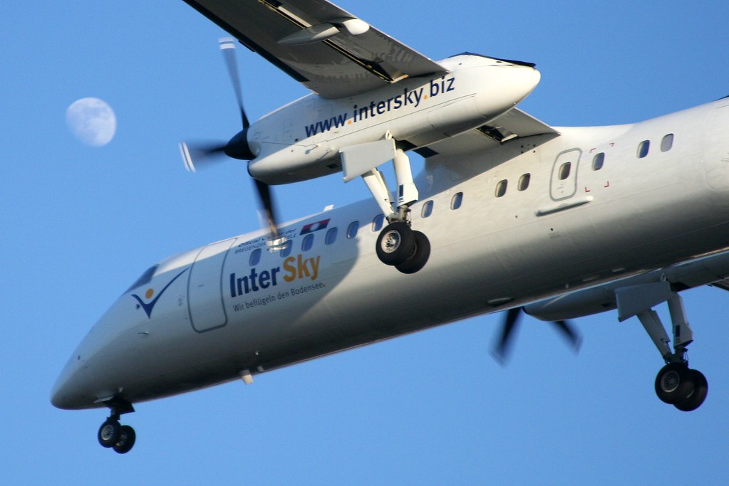 Airplane representing travel on an existing work visa