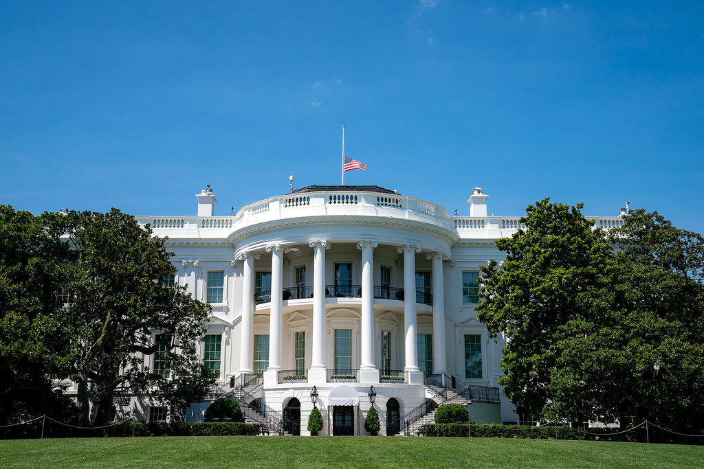 United States flag representing the federal E-Verify employment verification program