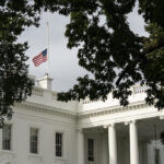 United States flag representing federal H-1B employment rules