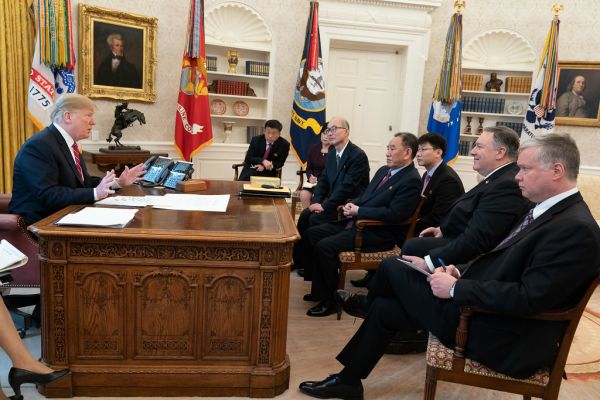 Employees at work representing employment-based green card sponsorship